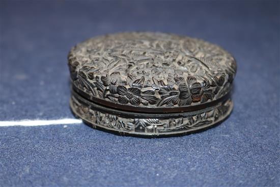 A 19th century Chinese export tortoiseshell circular box containing ivory gaming pieces